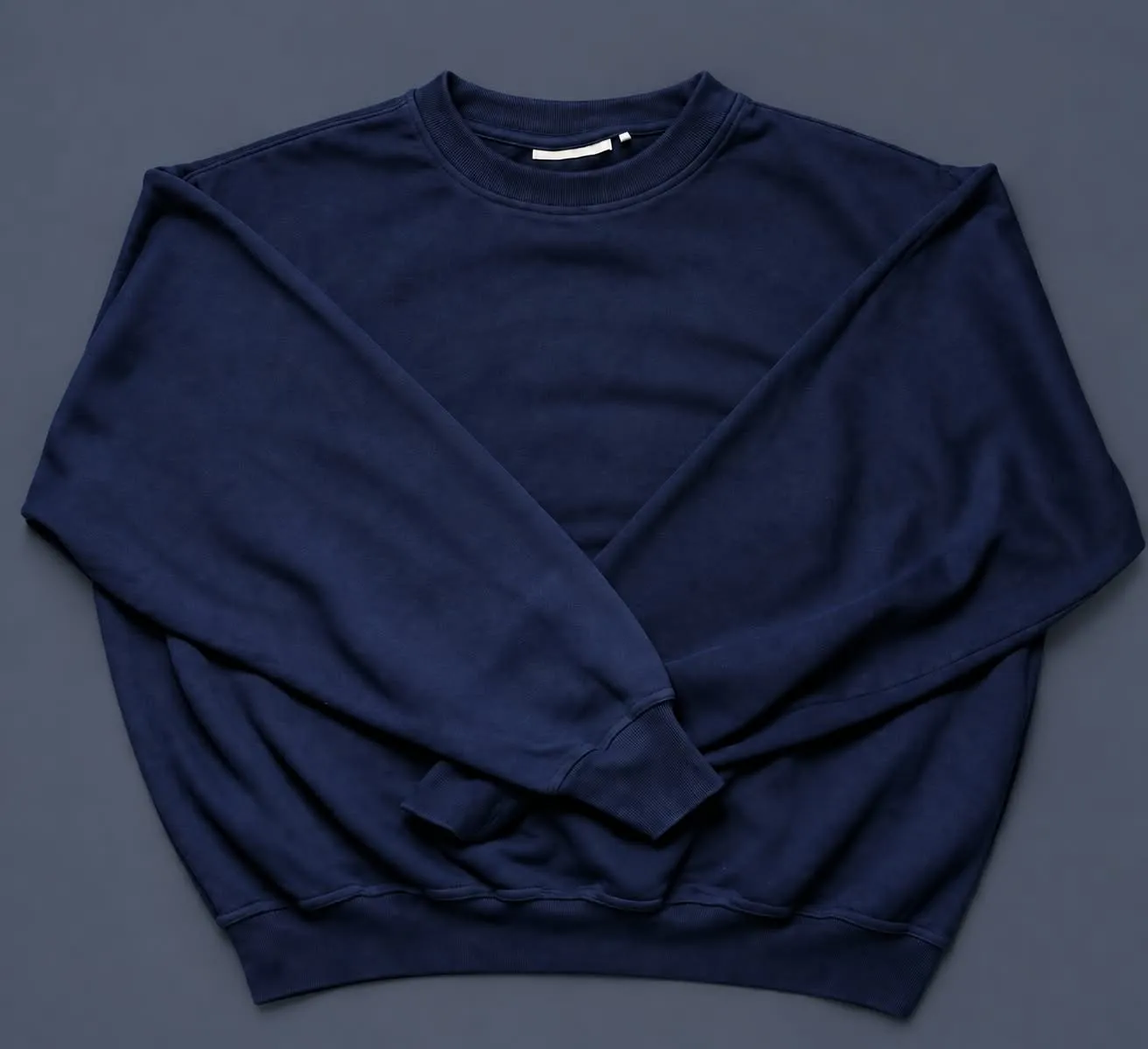Navy Sweatshirt Flat Lay